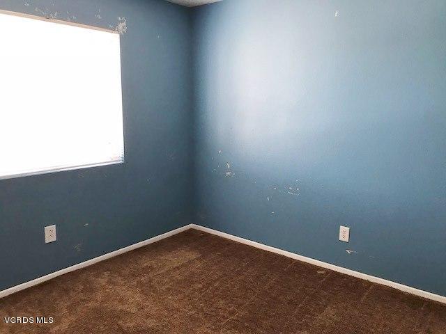 1027 Corte Primavera Oxnard, CA 93030 - Photo 10 of 17 an empty room with a window