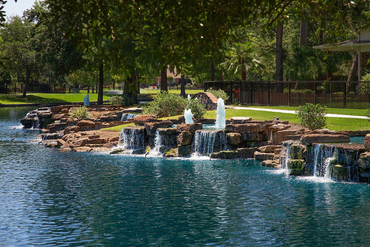 18722 Duke Lake Drive Spring, TX 77388 - Photo 26 of 26 a view of a lake with a patio