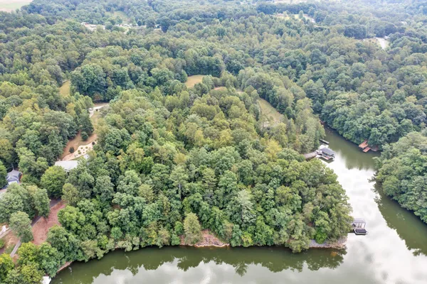 a view of a lake with trees
