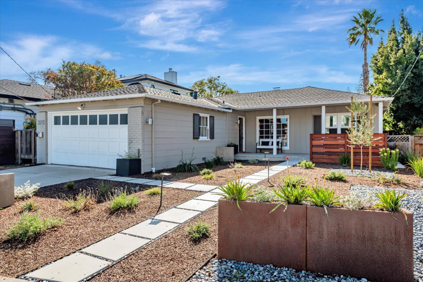 a front view of house with an outdoor space