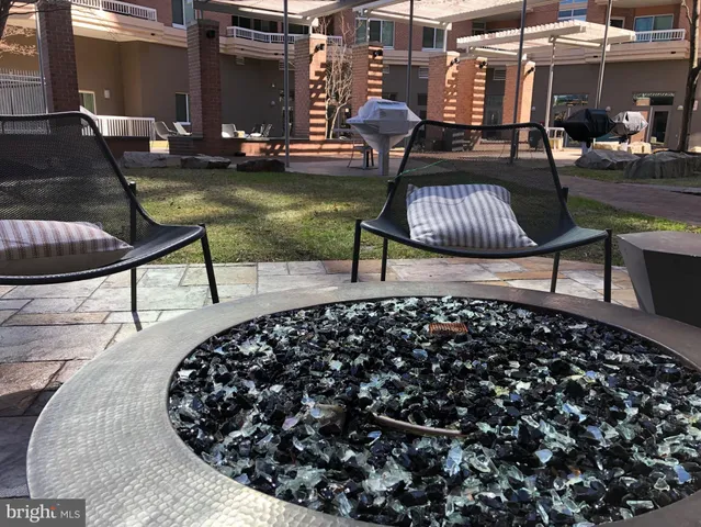 a view of swimming pool outdoor seating area