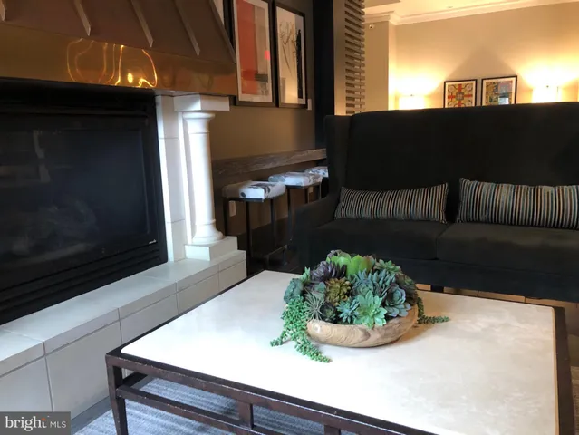 a kitchen with a sink and a microwave