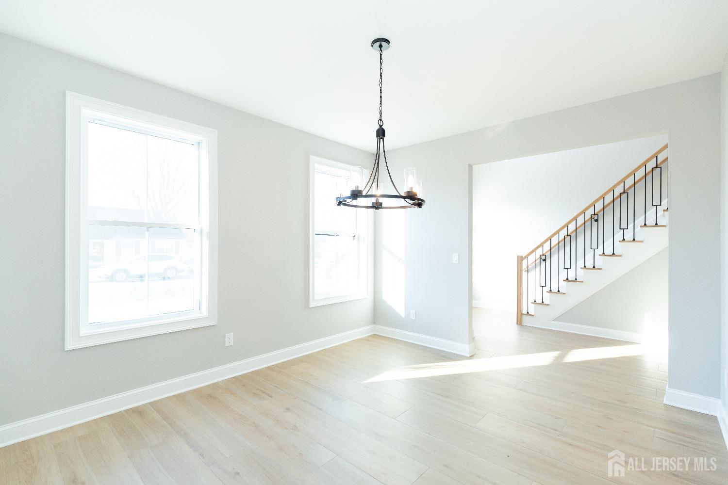 24 Parkerson Road Edison, NJ 08817 - Photo 11 of 56 a view of an entryway with wooden floor