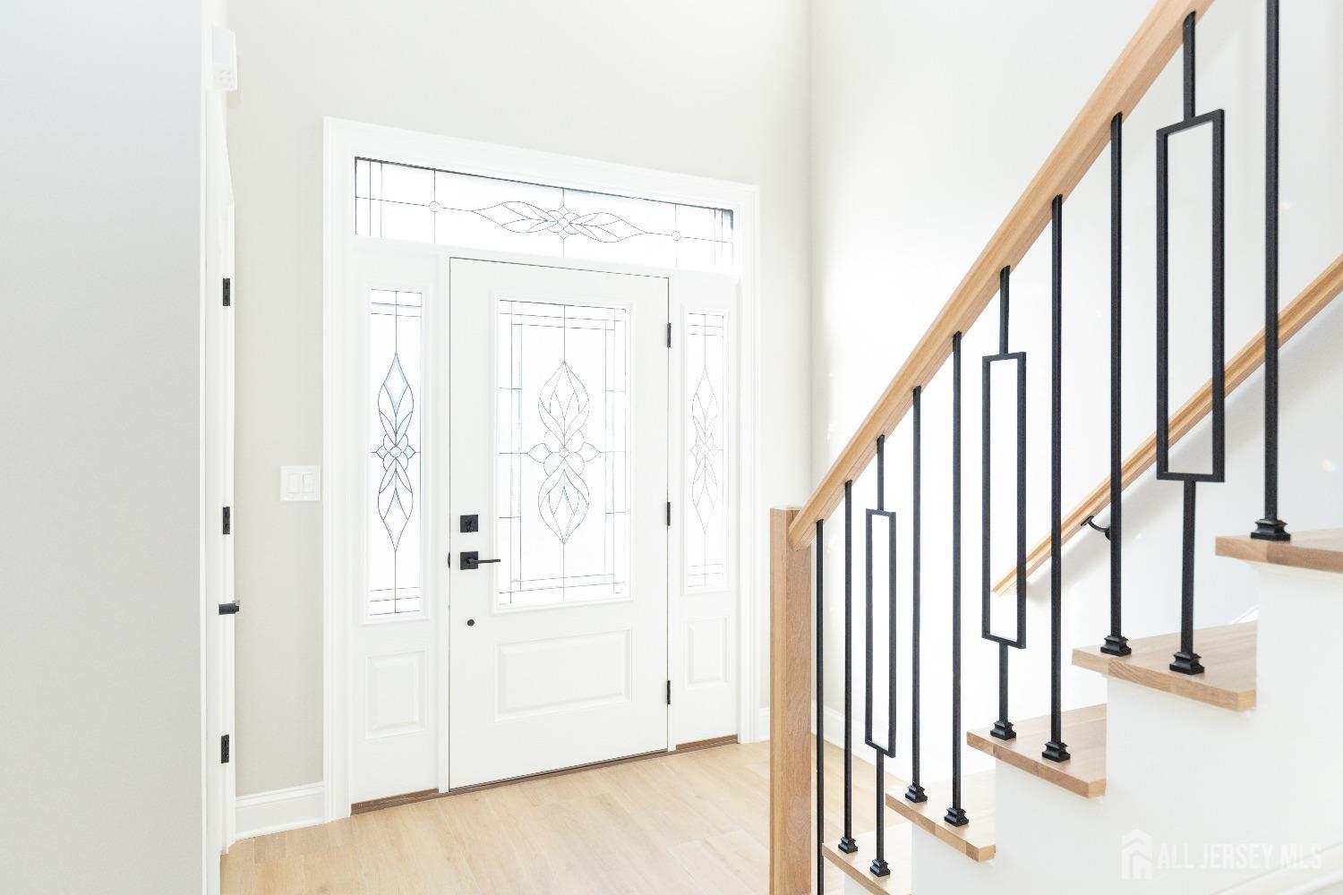 24 Parkerson Road Edison, NJ 08817 - Photo 3 of 56 a view of an entryway with staircase