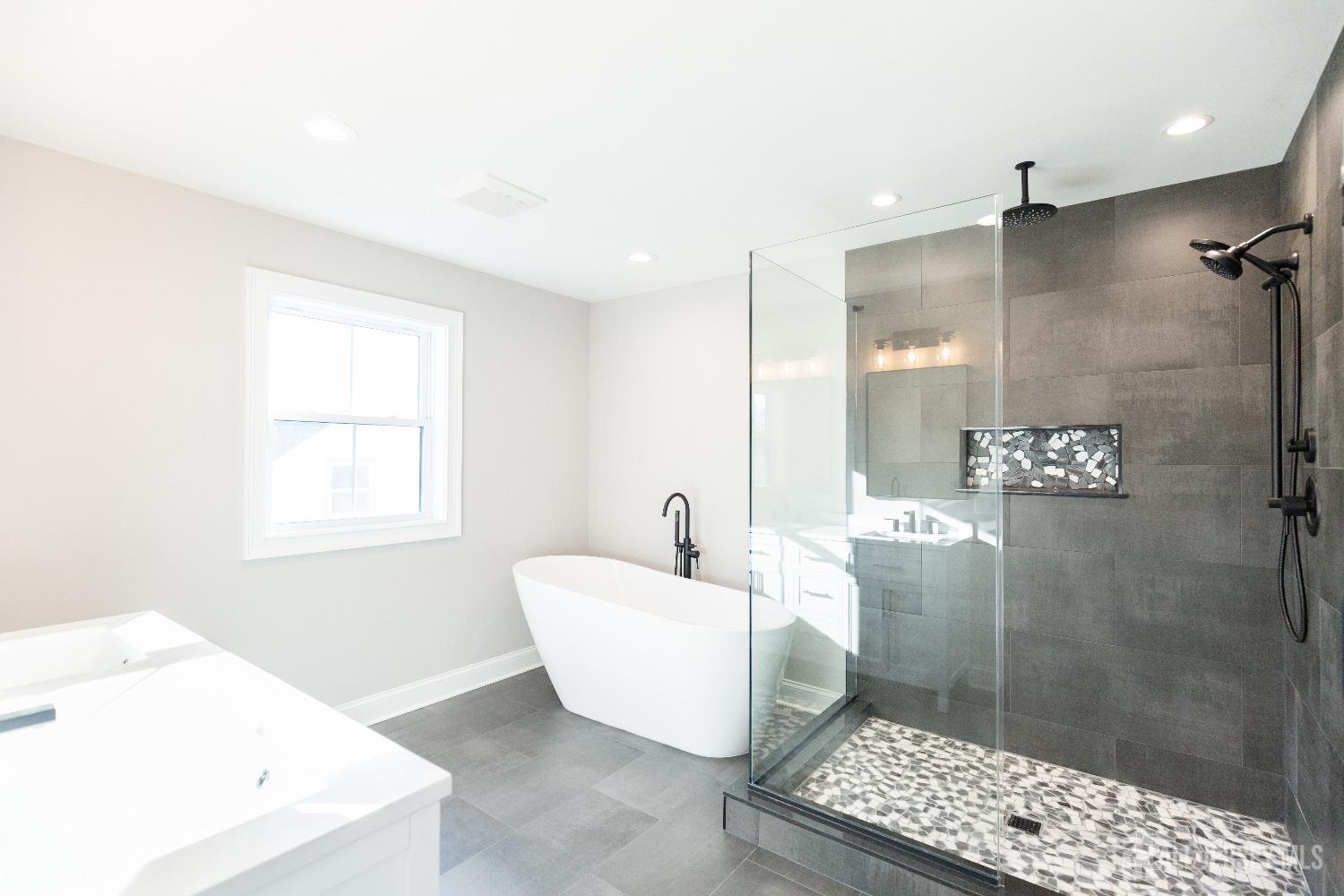 24 Parkerson Road Edison, NJ 08817 - Photo 33 of 56 a bathroom with a sink toilet and shower