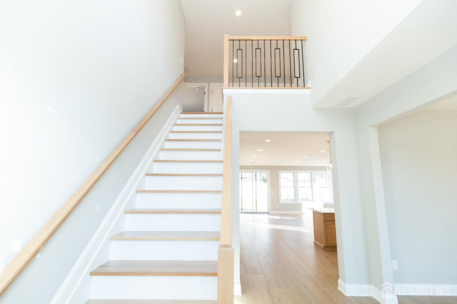 24 Parkerson Road Edison, NJ 08817 - Photo 4 of 56 a view of staircase with white walls and a next to a window