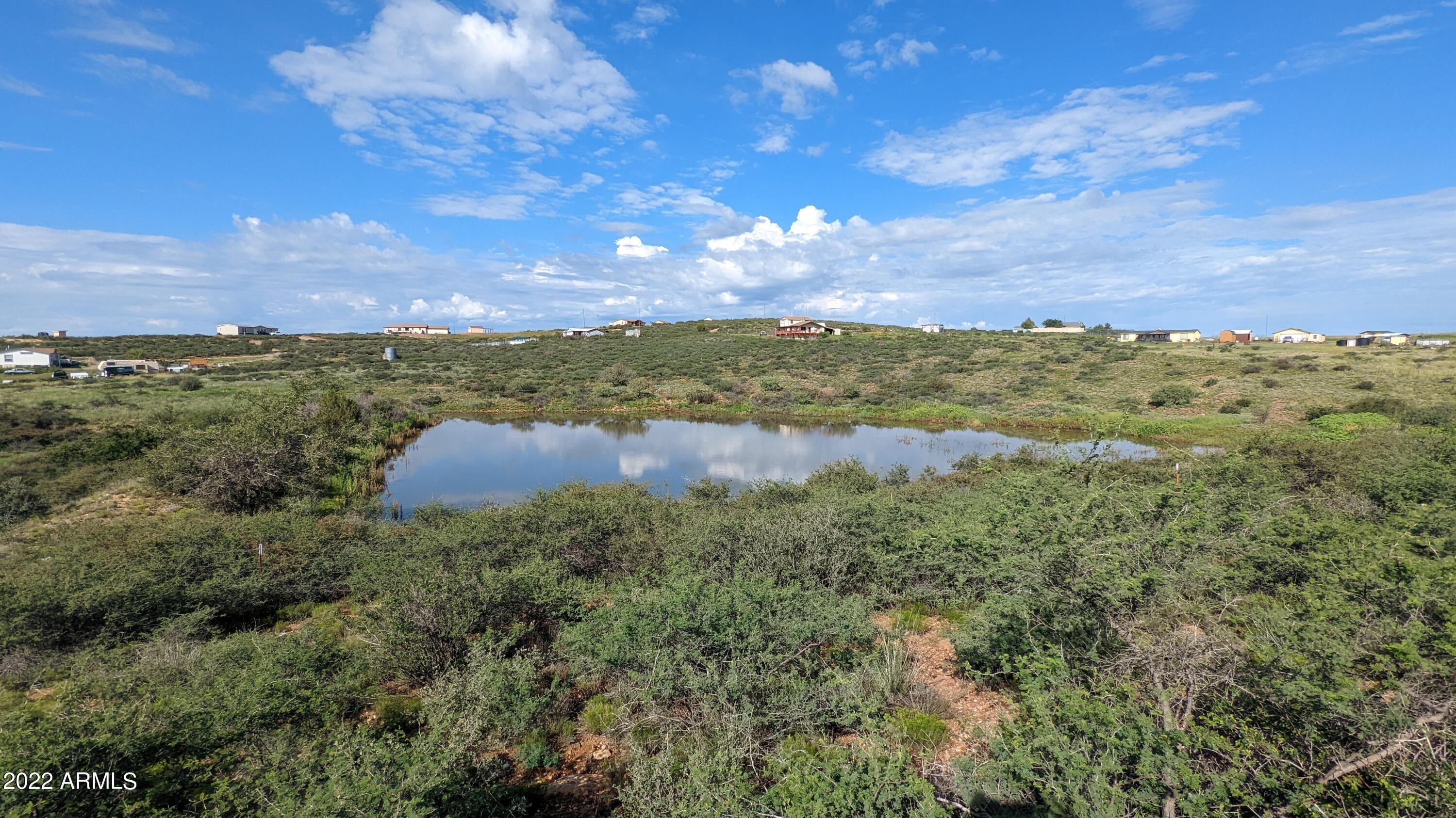 0 East Leprechaun Road, Unit 24K & 024L Dewey, AZ 86327 - Photo 8 of 13 a view of a lake with a city