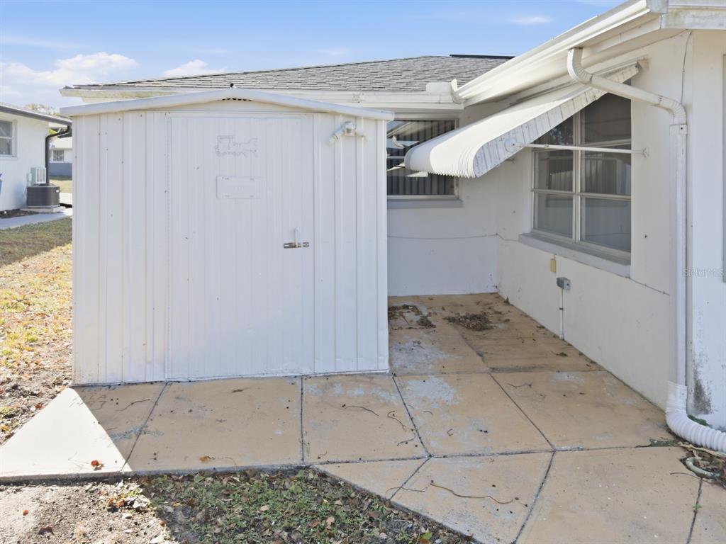 7903 Valmy Lane Port Richey, FL 34668 - Photo 36 of 40 a view of an empty room