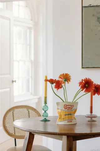 a vase of flowers sitting on a table