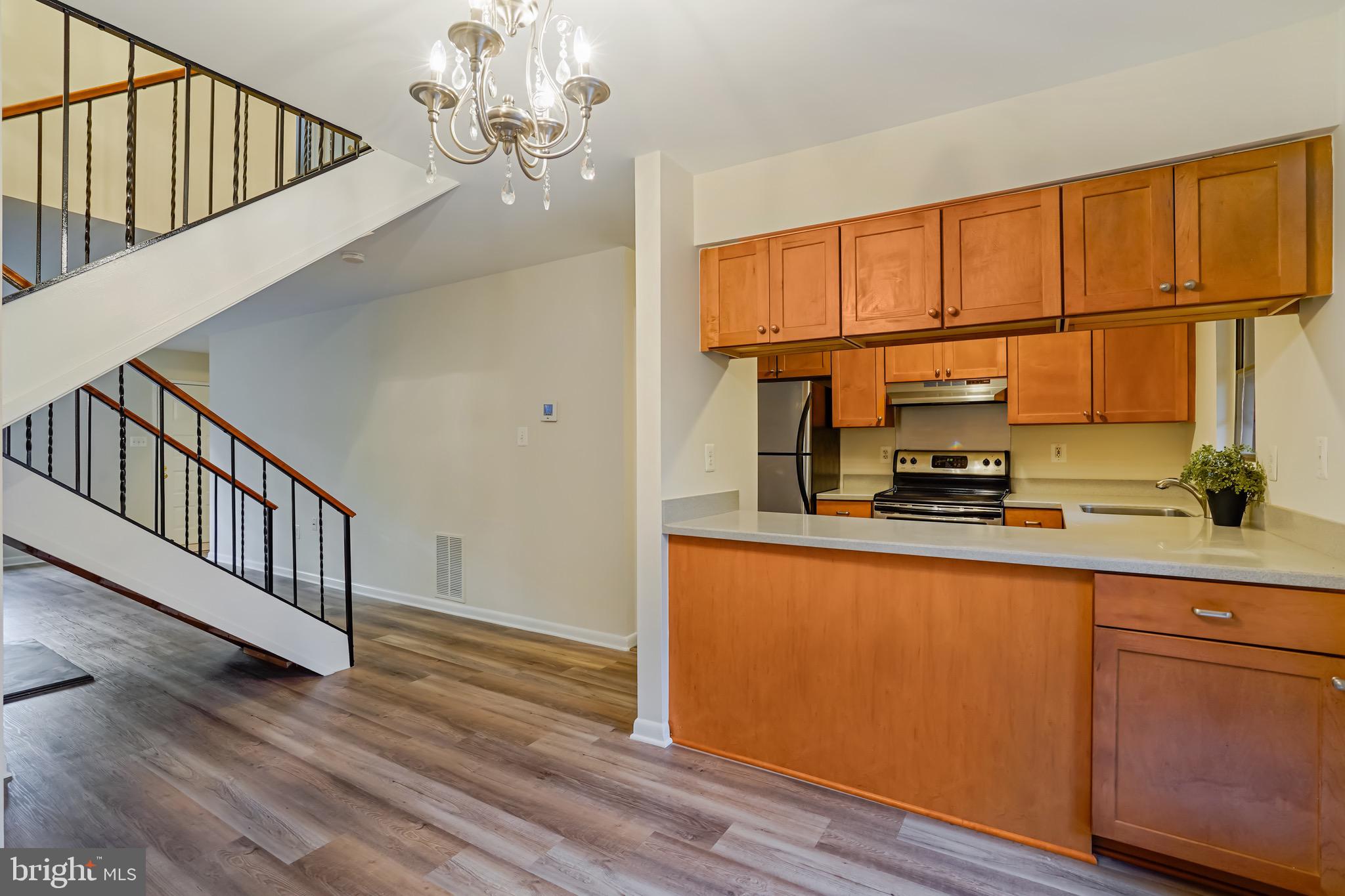 2023 Headlands Circle Reston, VA 20191 - Photo 43 of 44 Open concept floor plan with central stair case