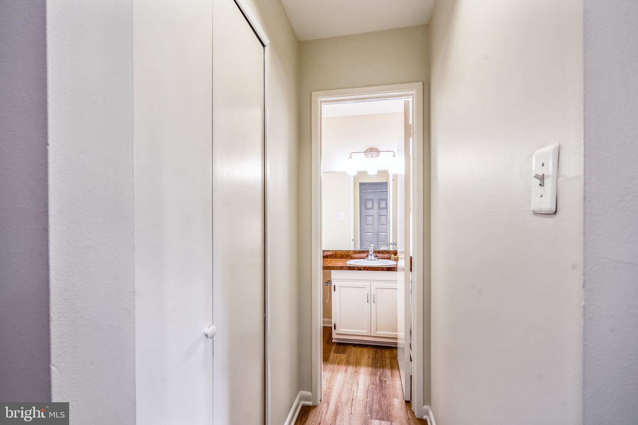 2023 Headlands Circle Reston, VA 20191 - Photo 7 of 44 Huge hall closet, foyer built-ins!