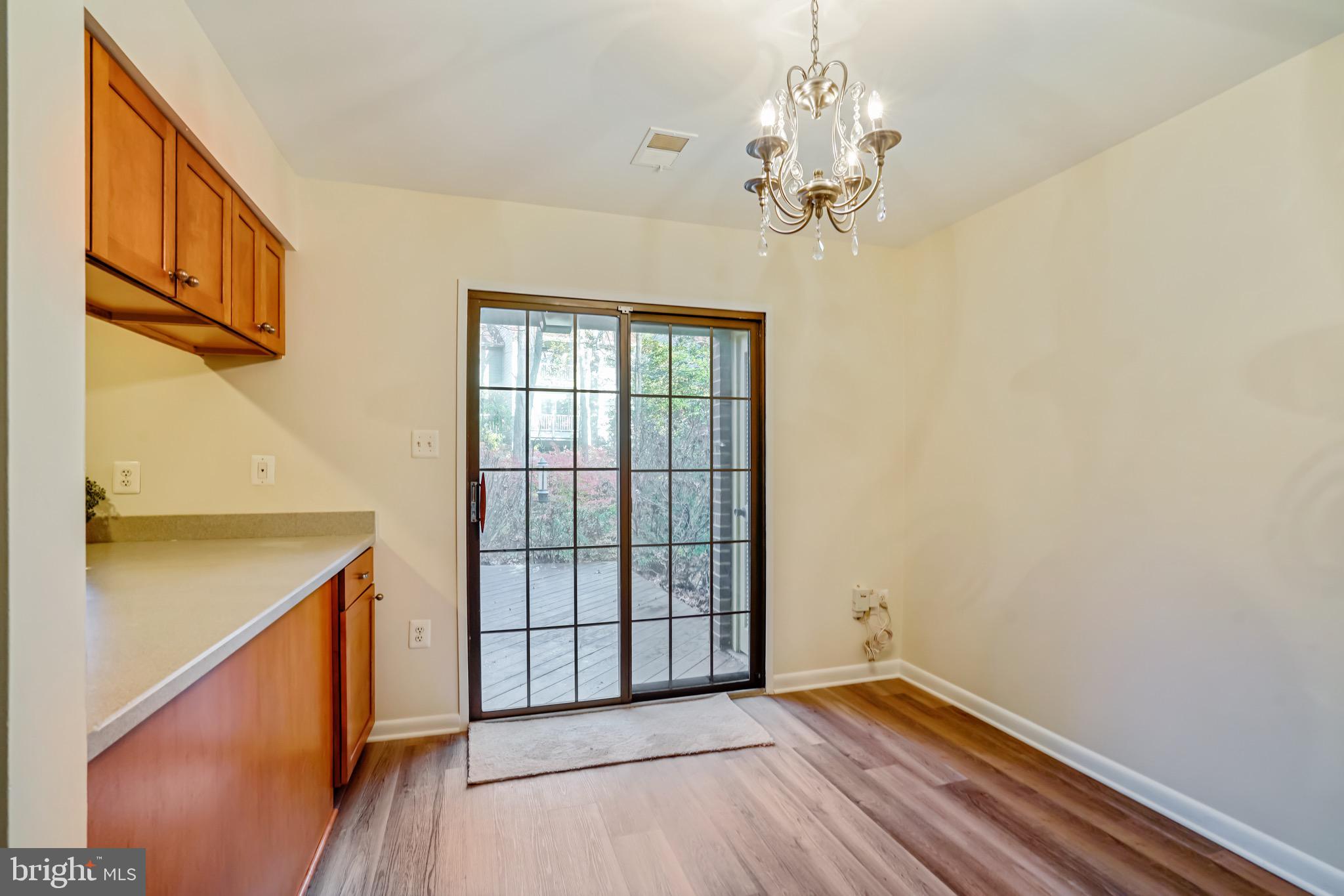 2023 Headlands Circle Reston, VA 20191 - Photo 9 of 44 Dinning room extends onto large deck