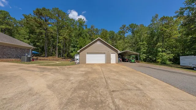 a house with trees in the background