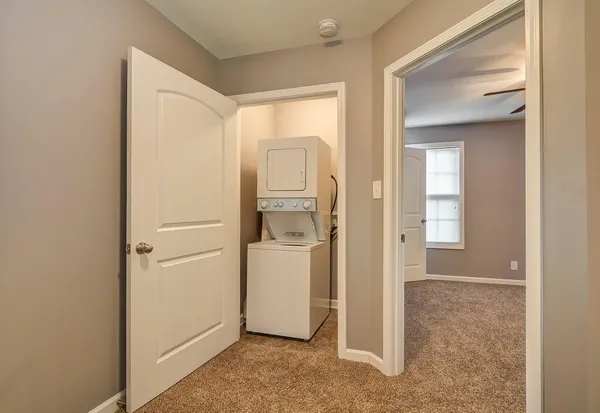a view of a utility room with closet area