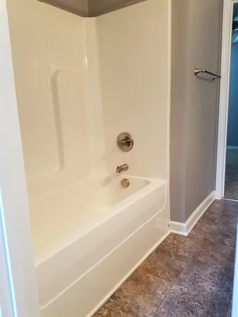 a bathroom with a bathtub