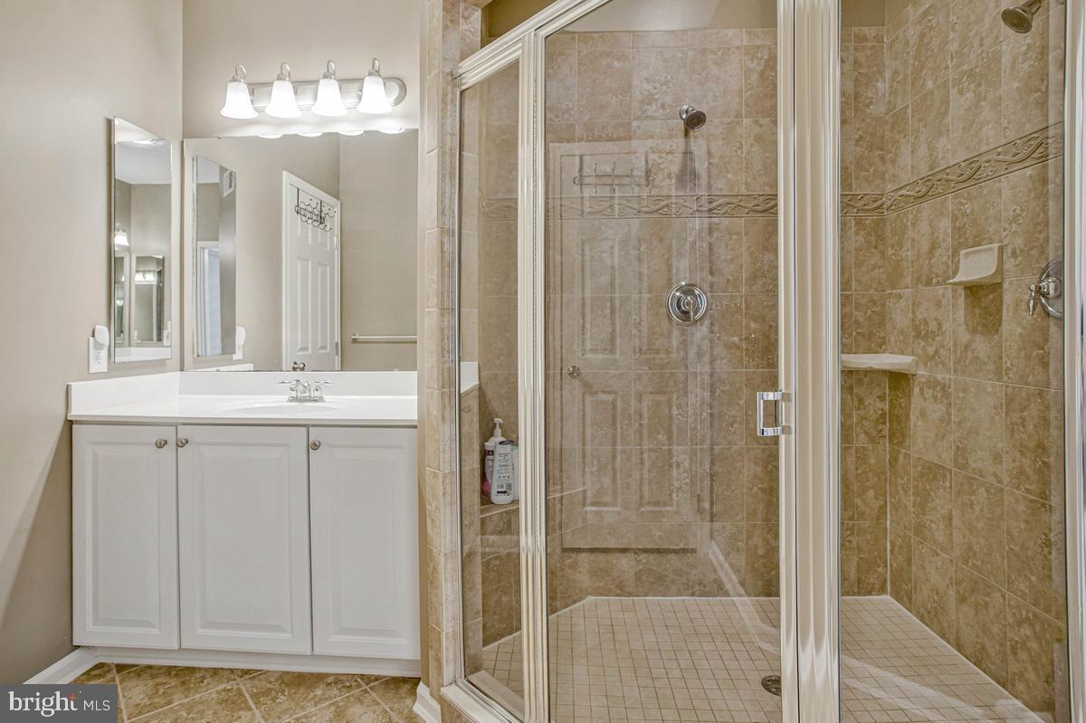2310 Forest Ridge Terrace, Unit 6 Chesapeake Beach, MD 20732 - Photo 24 of 58 Walk in shower