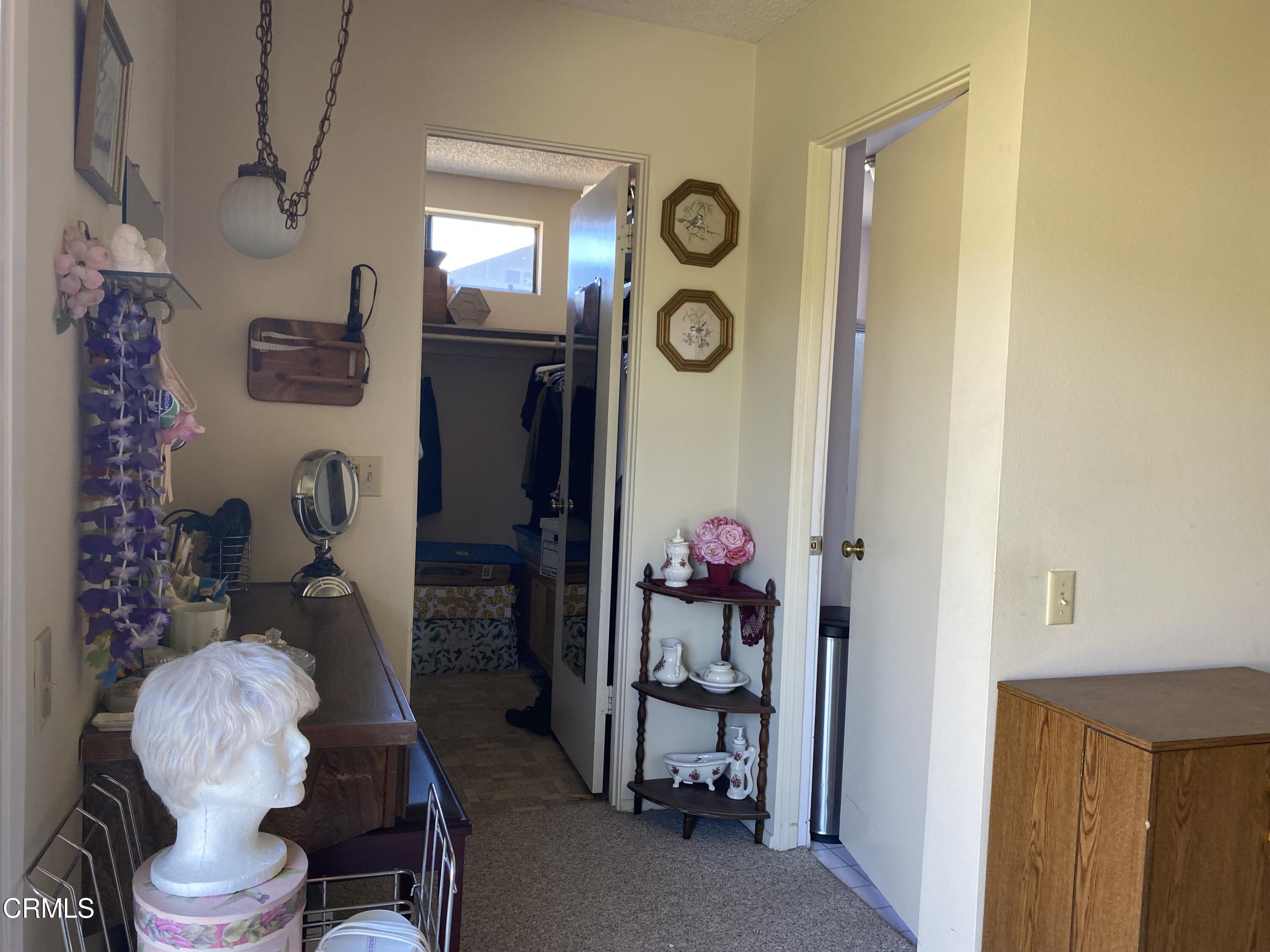 1341 Bottlebrush Place Oxnard, CA 93030 - Photo 15 of 25 a room with storage and utility