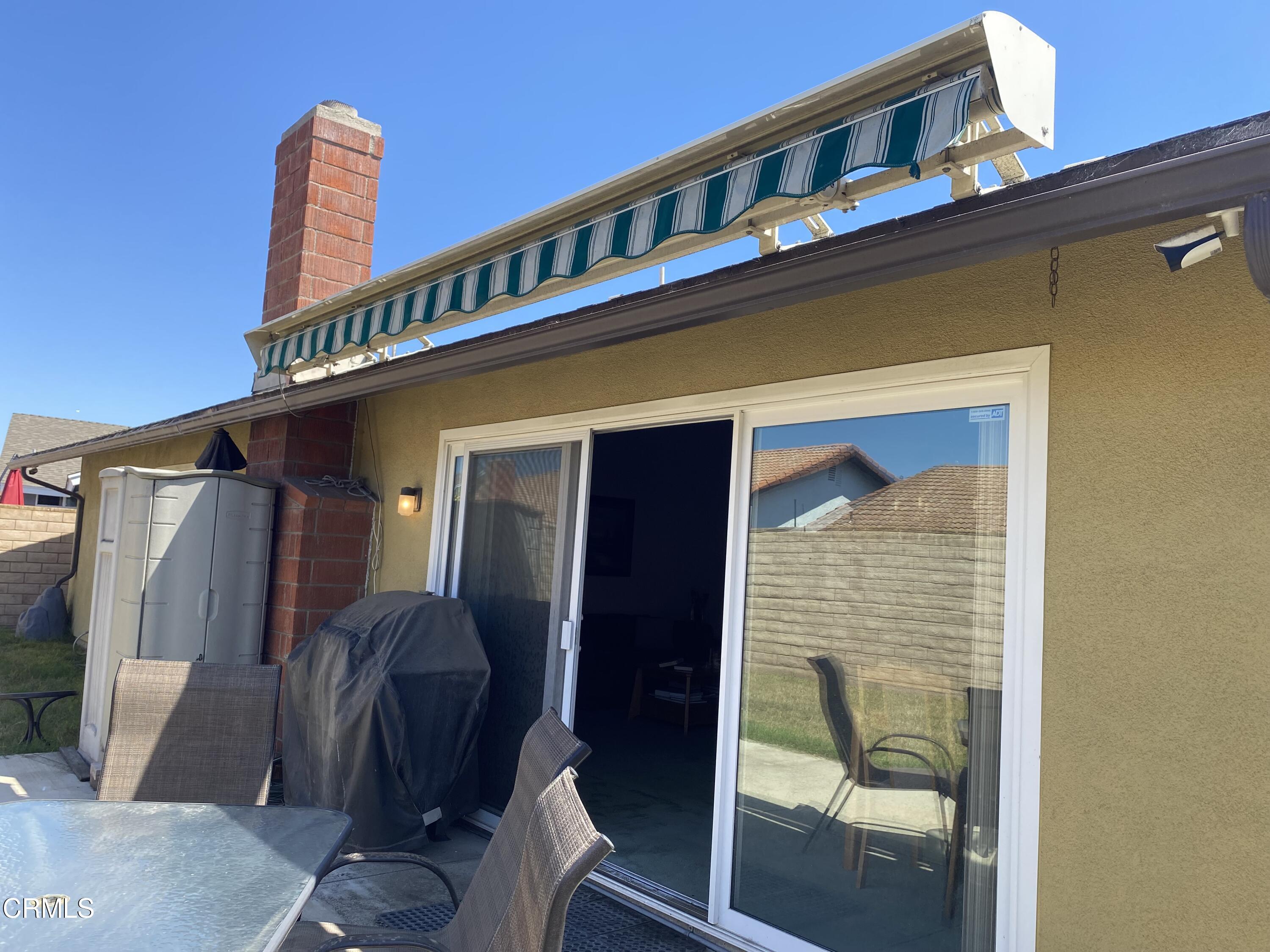 1341 Bottlebrush Place Oxnard, CA 93030 - Photo 23 of 25 a front view of a house with glass windows