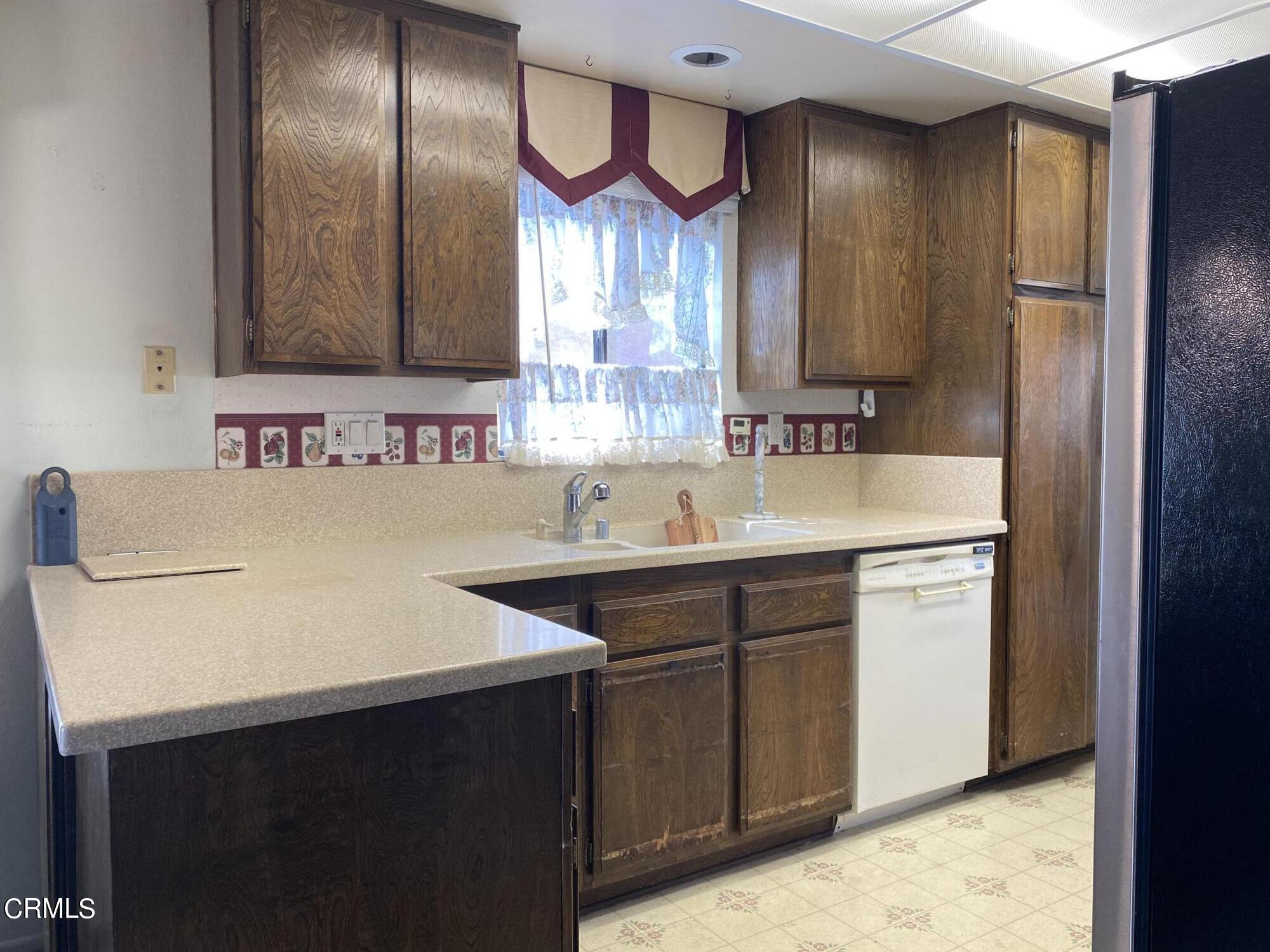 1341 Bottlebrush Place Oxnard, CA 93030 - Photo 9 of 25 a bathroom with a sink and a mirror