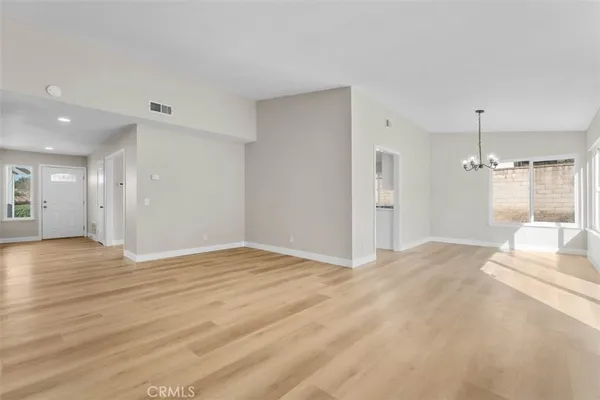 a view of an empty room and window