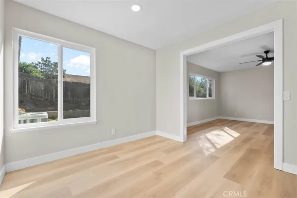 a view of an empty room and window