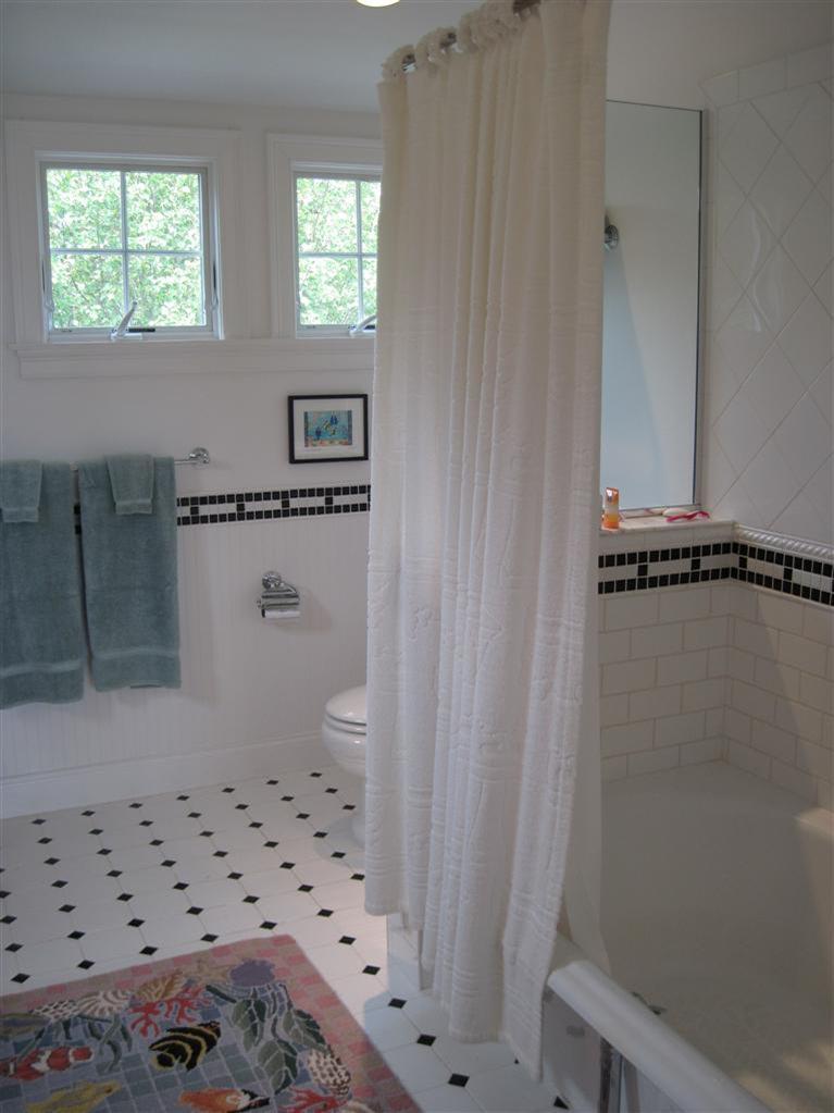 173 Beach Road Orleans, MA 02653 - Photo 19 of 35 a bathroom with a bathtub and shower