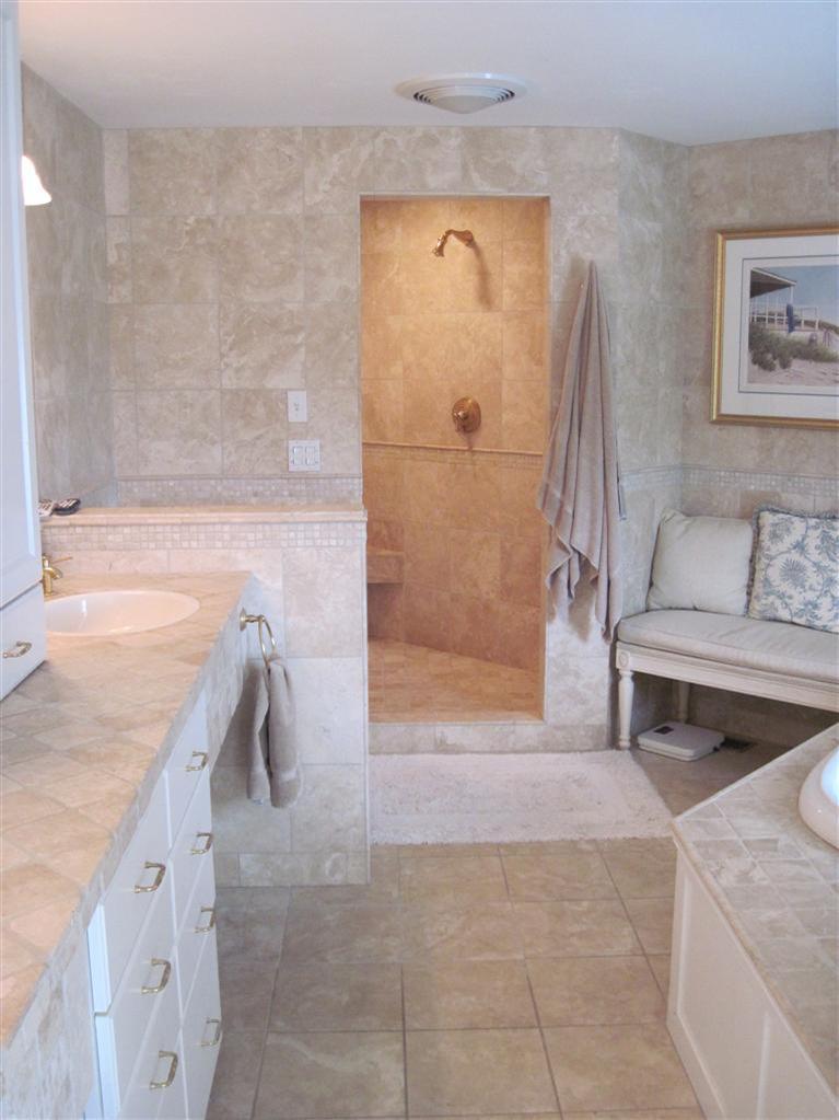 173 Beach Road Orleans, MA 02653 - Photo 25 of 35 a bathroom with a granite countertop sink a toilet and bathtub