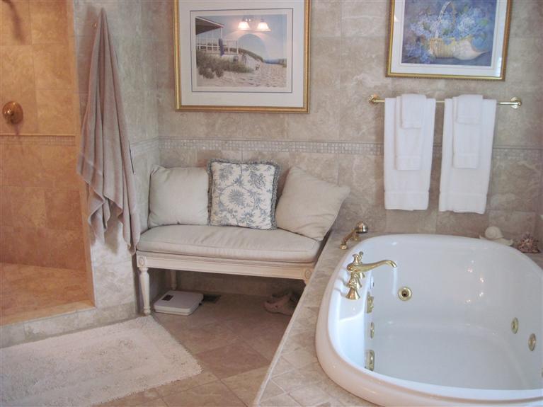173 Beach Road Orleans, MA 02653 - Photo 26 of 35 a white bath tub sitting in a bathroom