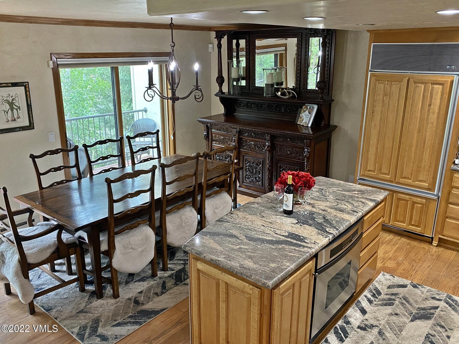 1881 Lions Ridge Loop, Unit 25 Vail, CO 81657 - Photo 14 of 31 Dining area with walk out to balcony