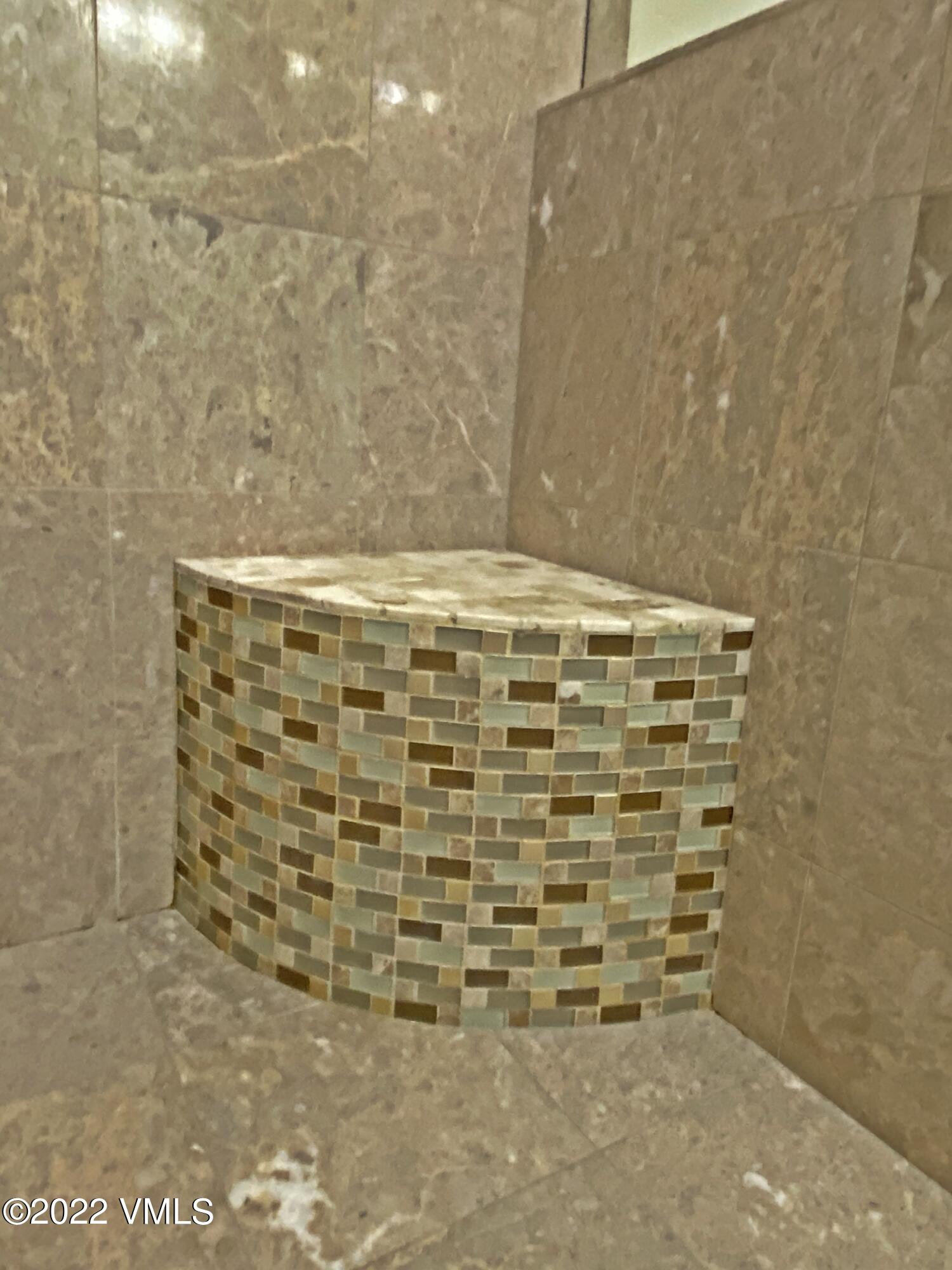 1881 Lions Ridge Loop, Unit 25 Vail, CO 81657 - Photo 23 of 31 Tile bench in Euro shower