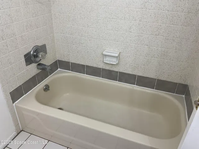 a bathroom with a bathtub