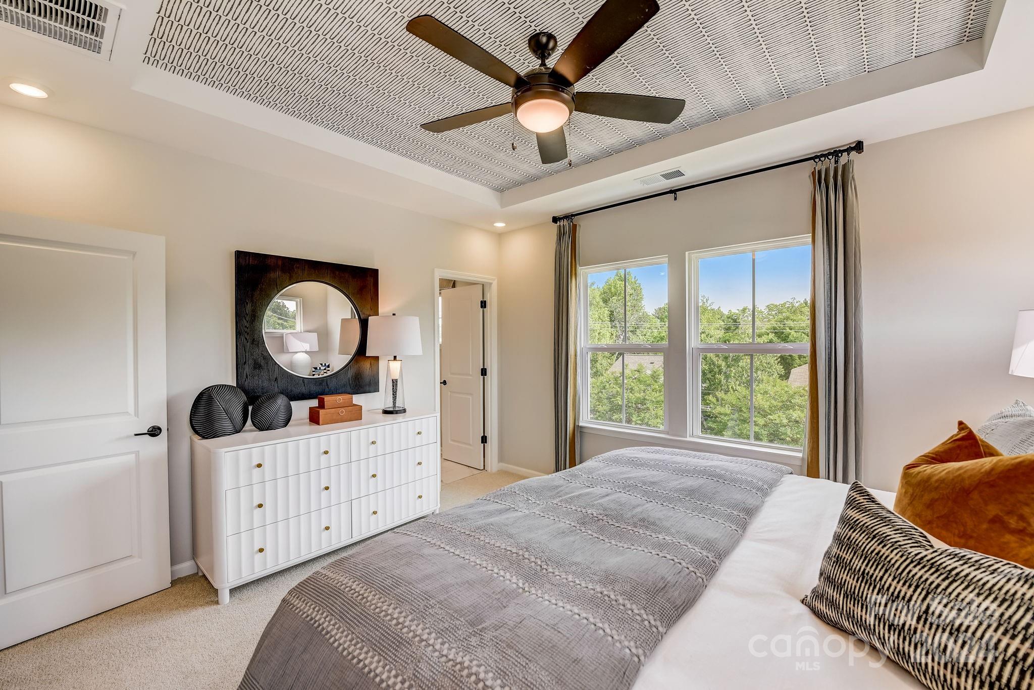 109 Goodson Place Davidson, NC 28036 - Photo 27 of 40 a bedroom with furniture and a window