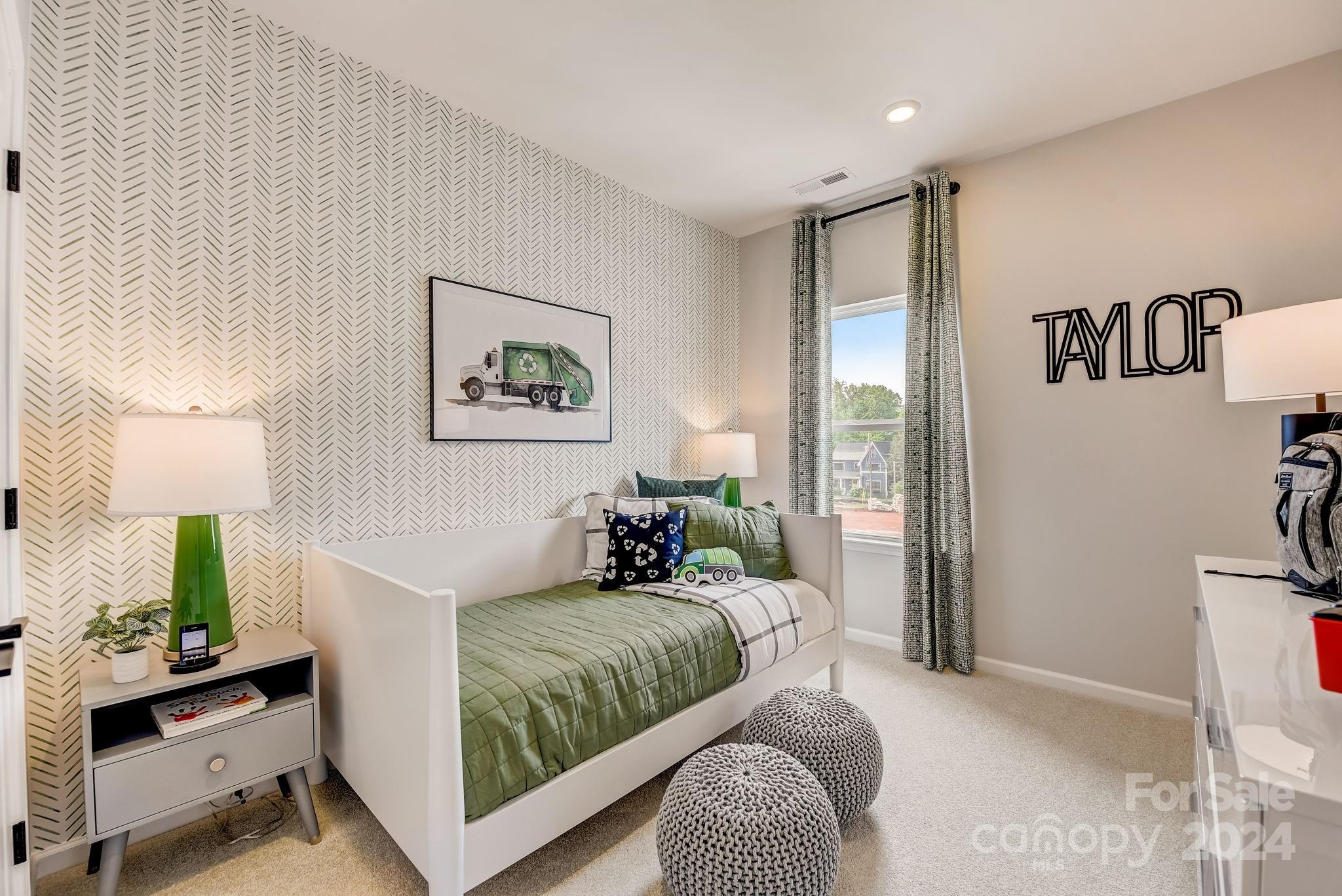 109 Goodson Place Davidson, NC 28036 - Photo 32 of 40 a bedroom with a bed and a couch