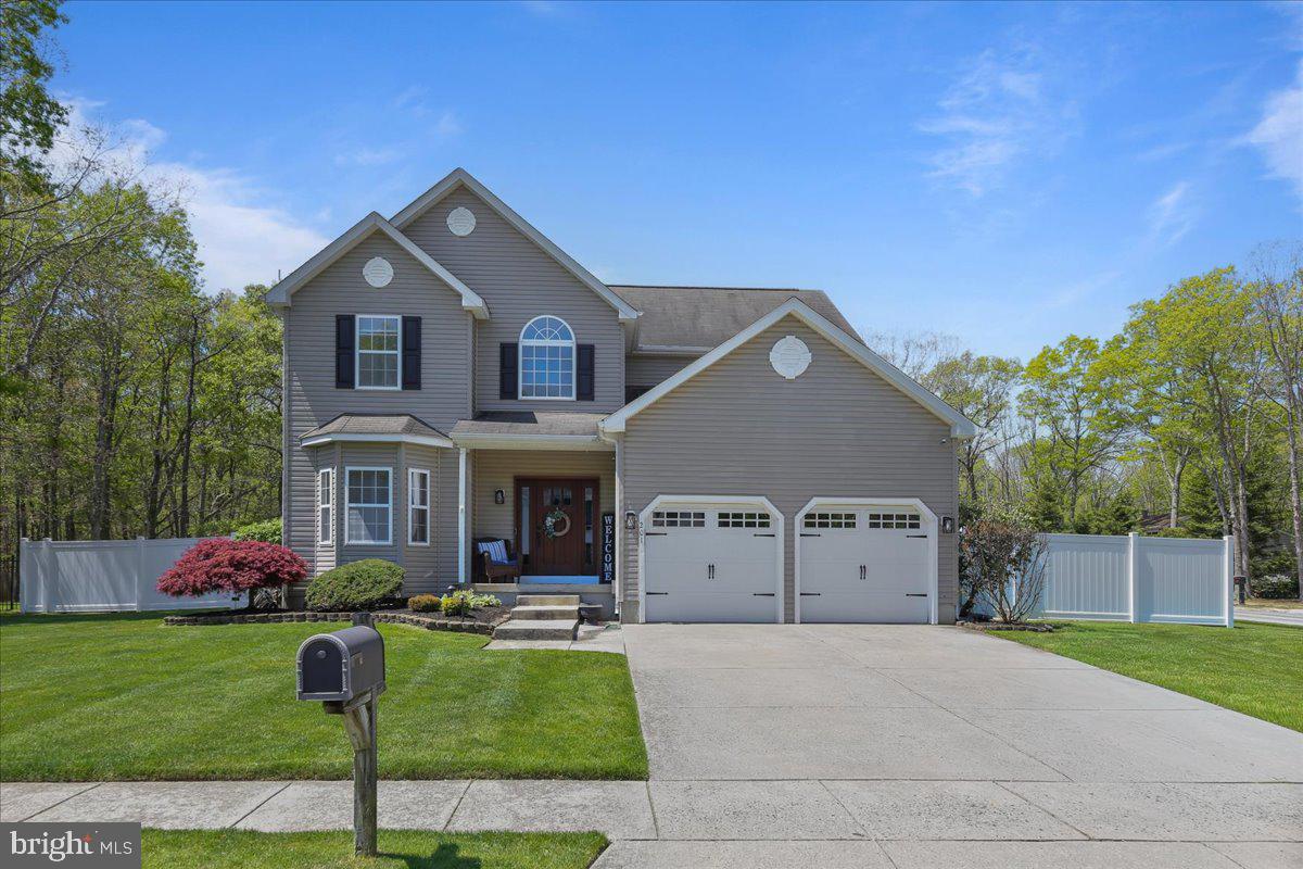 201 Prancer Road Egg Harbor Township, NJ 08234 - Photo 1 of 66 a front view of house with yard and green space