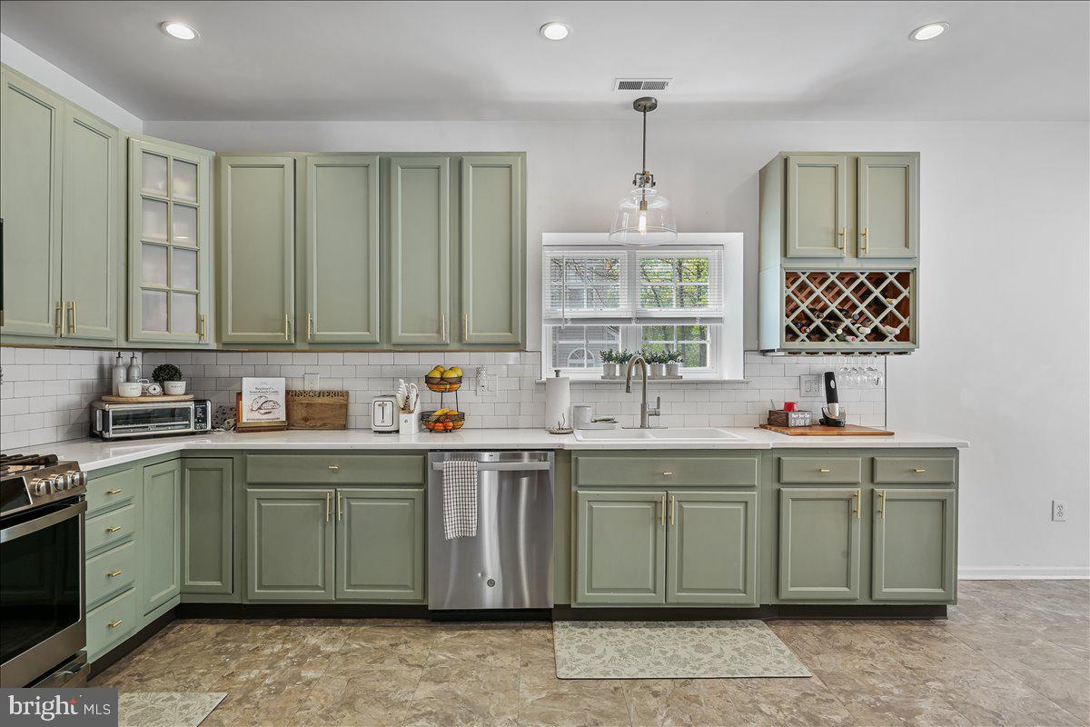 201 Prancer Road Egg Harbor Township, NJ 08234 - Photo 13 of 66 a kitchen with a sink cabinets and window