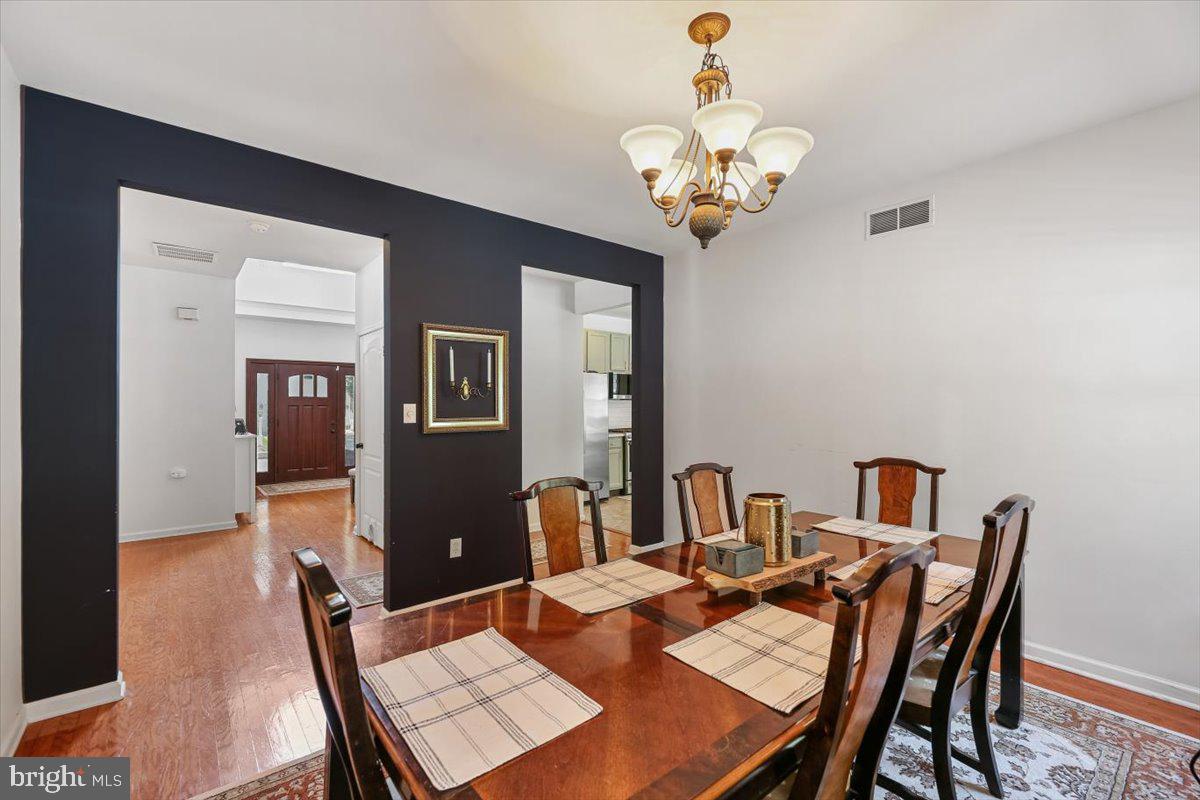 201 Prancer Road Egg Harbor Township, NJ 08234 - Photo 22 of 66 a view of a dining room with furniture and chandelier