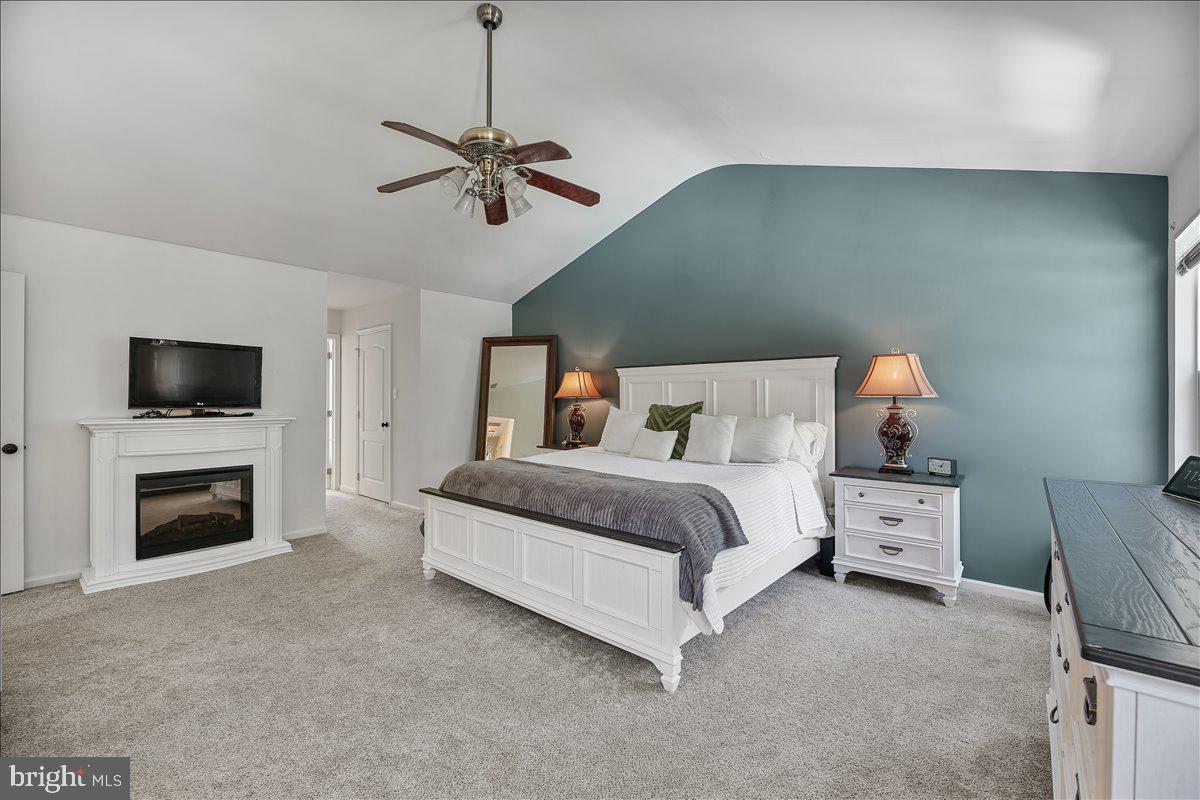 201 Prancer Road Egg Harbor Township, NJ 08234 - Photo 27 of 66 a bedroom with a bed and a flat screen tv