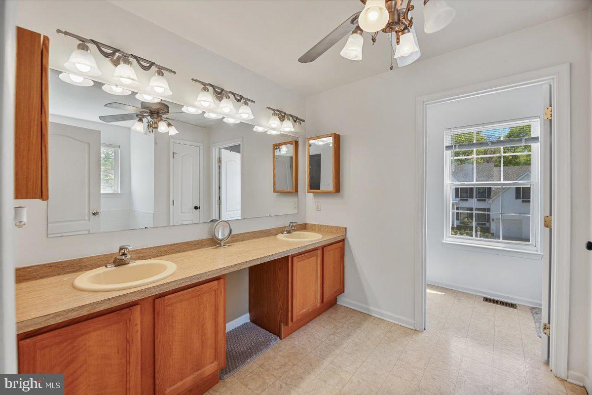 201 Prancer Road Egg Harbor Township, NJ 08234 - Photo 29 of 66 a bathroom with a sink double vanity and a mirror