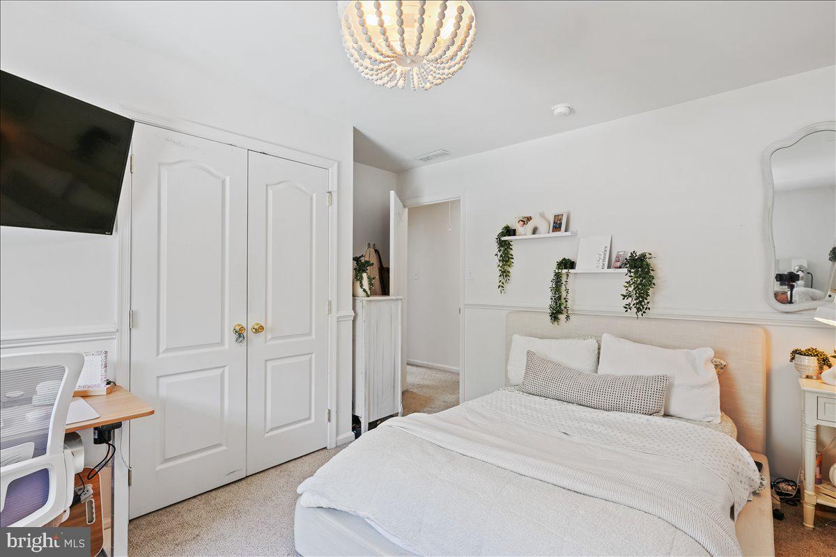 201 Prancer Road Egg Harbor Township, NJ 08234 - Photo 36 of 66 a bedroom with a bed and a television