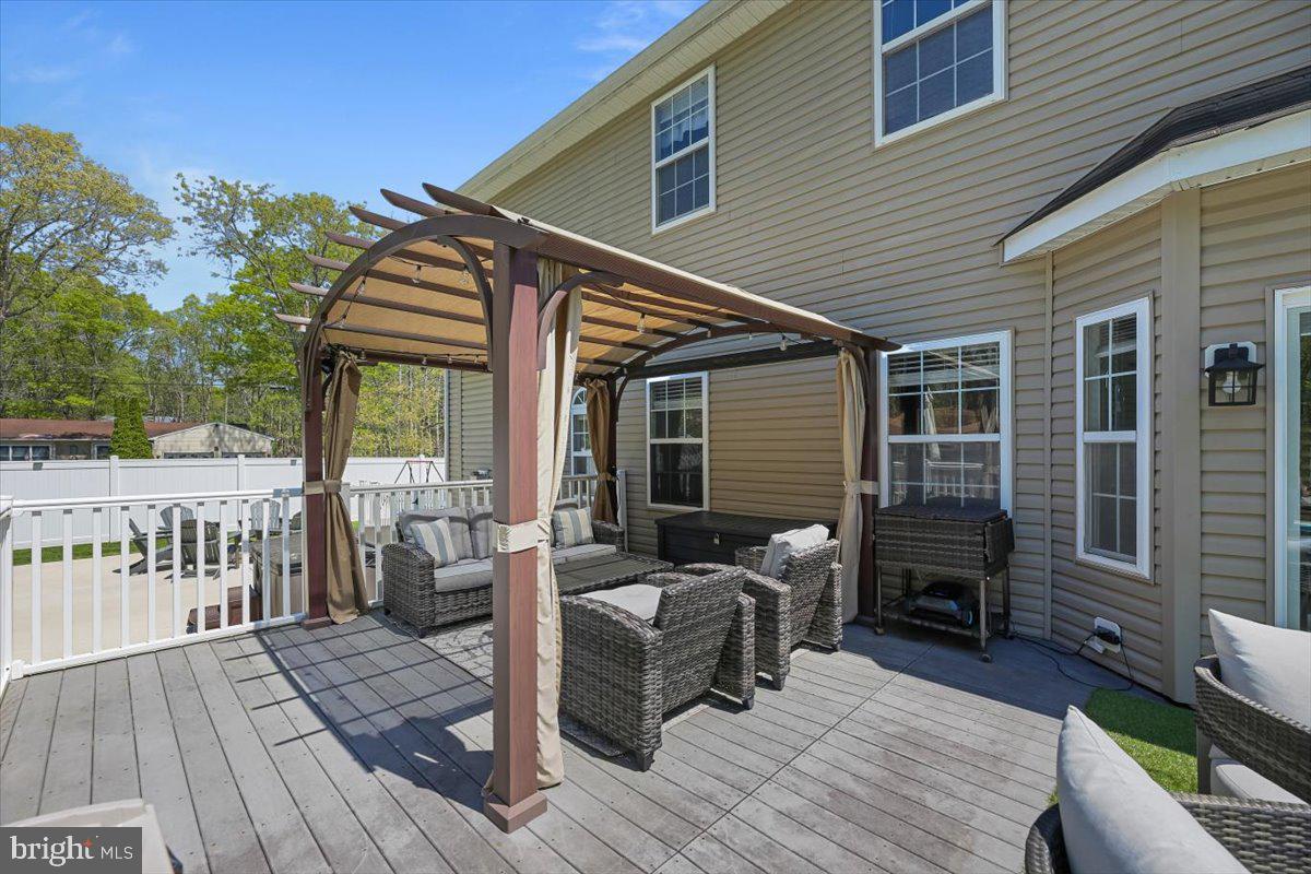 201 Prancer Road Egg Harbor Township, NJ 08234 - Photo 50 of 66 a view of a deck with furniture