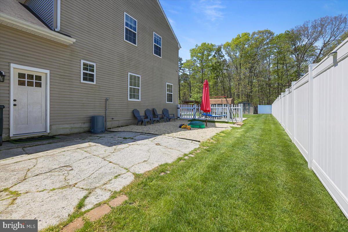 201 Prancer Road Egg Harbor Township, NJ 08234 - Photo 56 of 66 a view of a backyard of the house