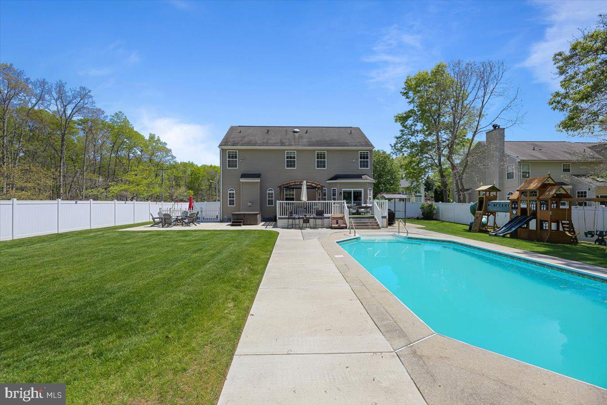 201 Prancer Road Egg Harbor Township, NJ 08234 - Photo 60 of 66 a view of house with swimming pool yard and outdoor seating