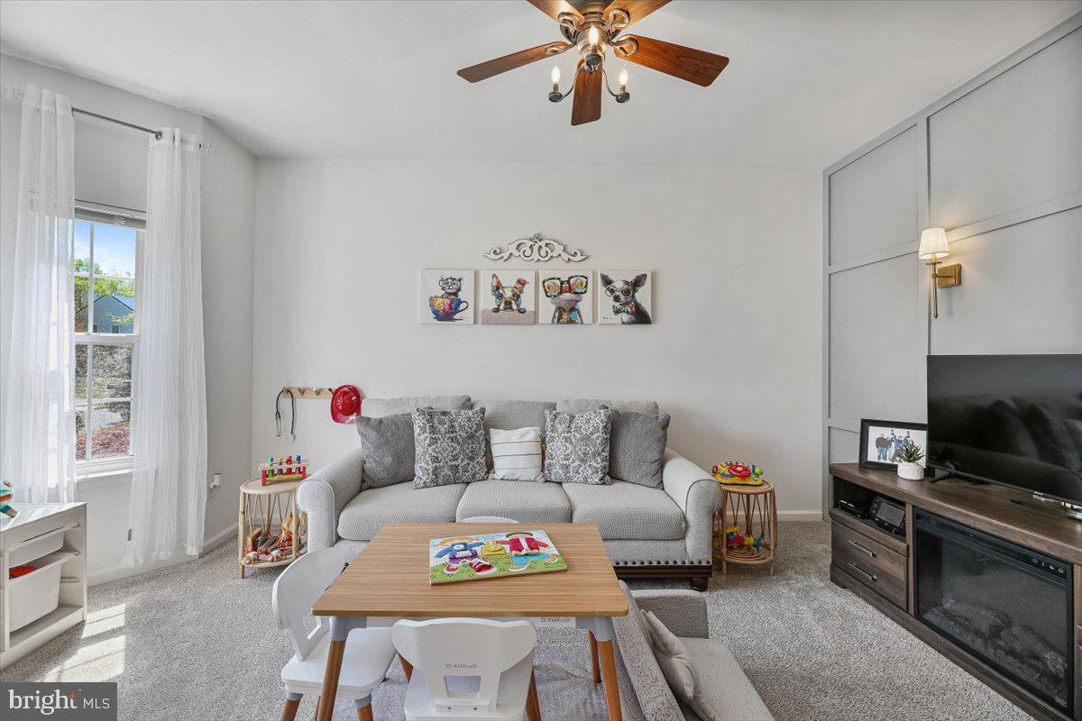 201 Prancer Road Egg Harbor Township, NJ 08234 - Photo 6 of 66 a living room with furniture and a flat screen tv
