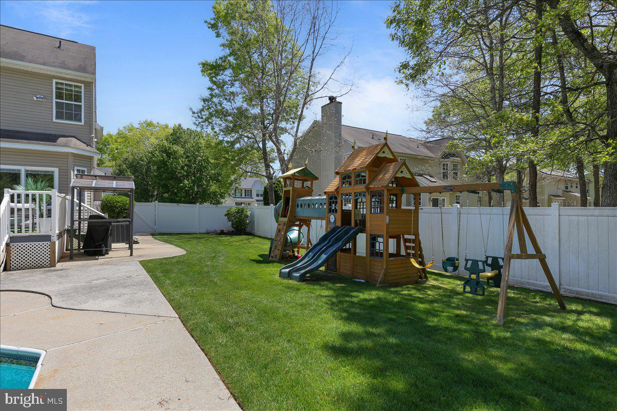 201 Prancer Road Egg Harbor Township, NJ 08234 - Photo 64 of 66 a view of a park with slide