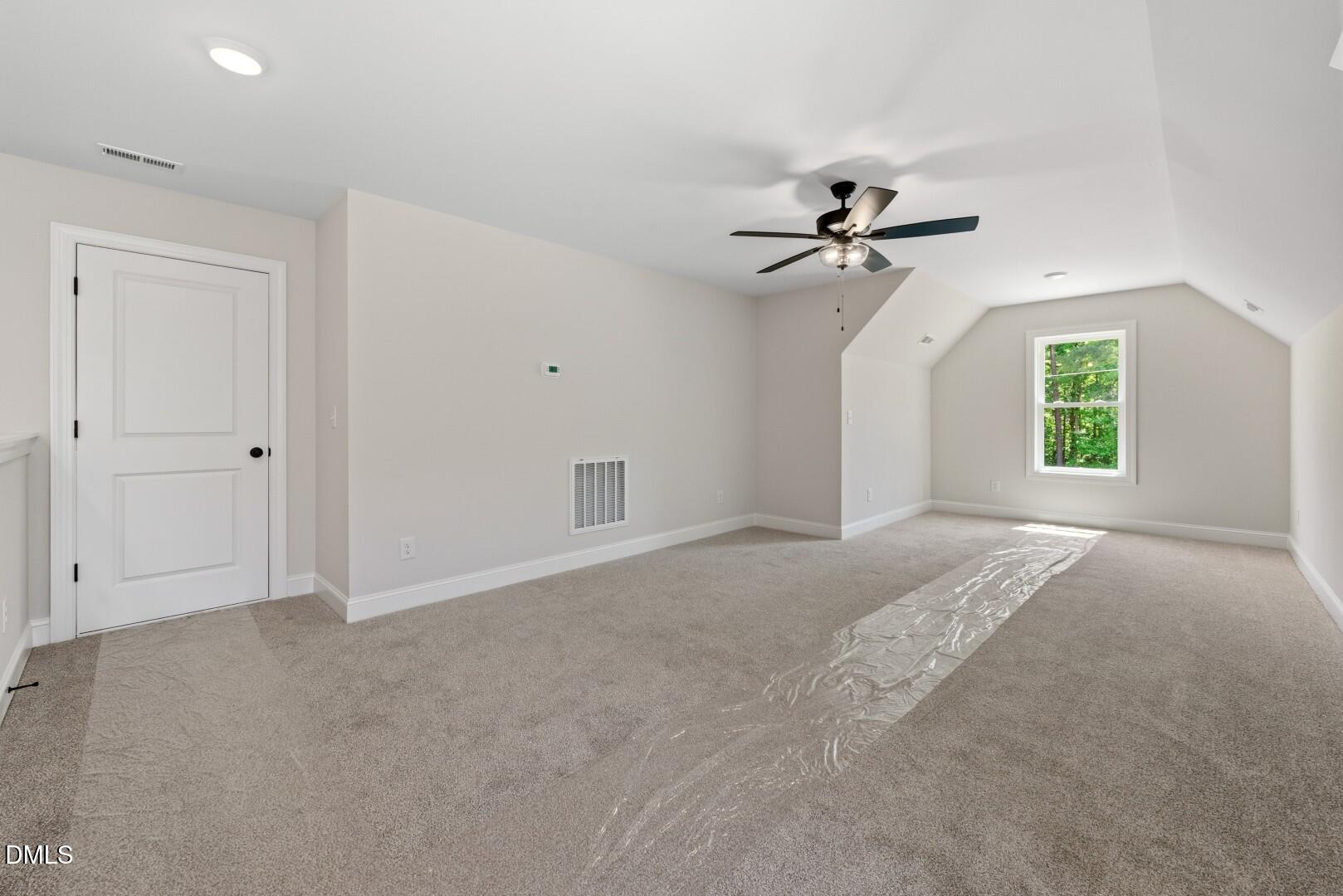 2251 Peachtree Hills Road Spring Hope, NC 27882 - Photo 32 of 46 wooden floor in an empty room with a window