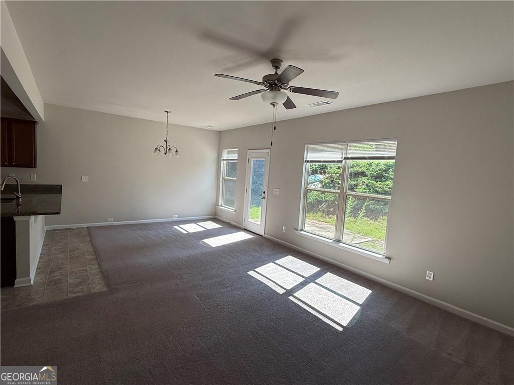 149 Hardy Water Drive Southeast Lawrenceville, GA 30045 - Photo 7 of 8 a view of an empty room with a window
