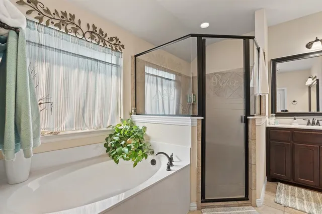 a bed room with a bed and a window