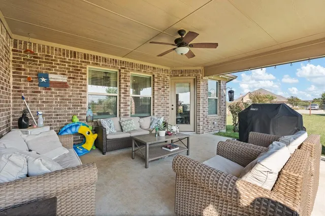 a view of a lake with houses in the back