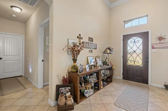a kitchen with a sink a counter space appliances and cabinets