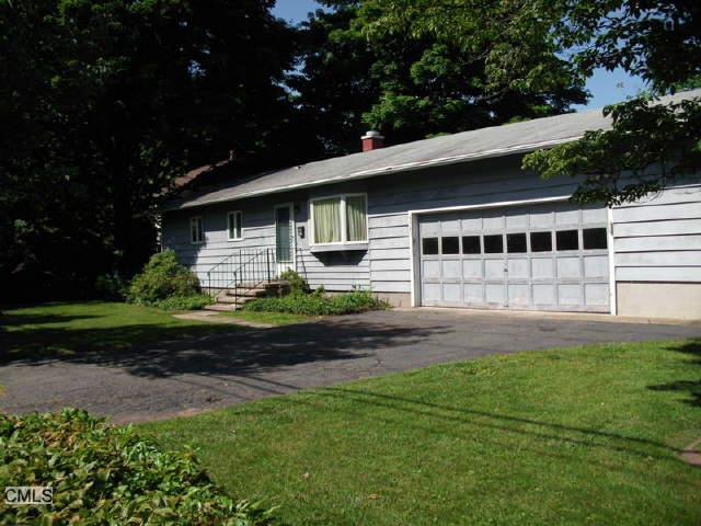 1383 Mill Plain Road Fairfield, CT 06824 - Photo 1 of 1 a front view of a house with a yard and porch